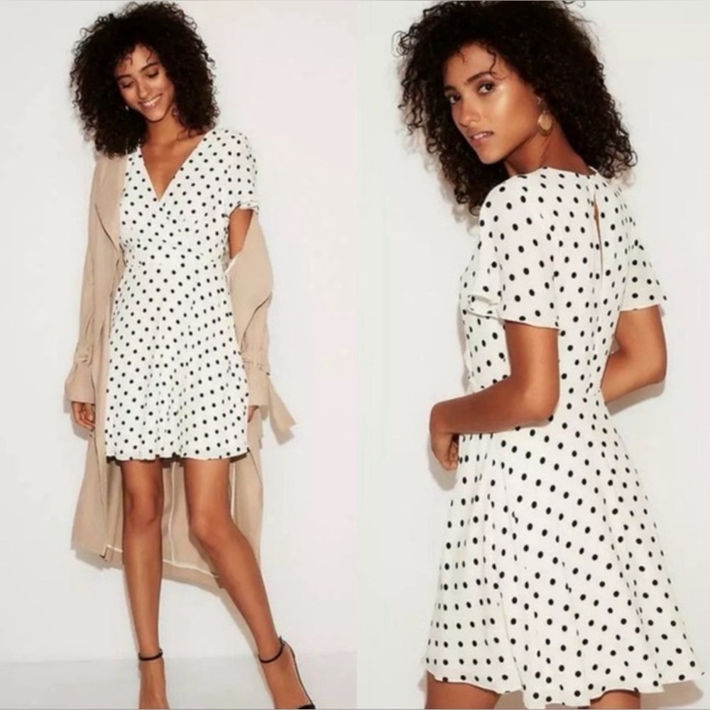 Express white dress with black polka dots. Midi length, size 6.